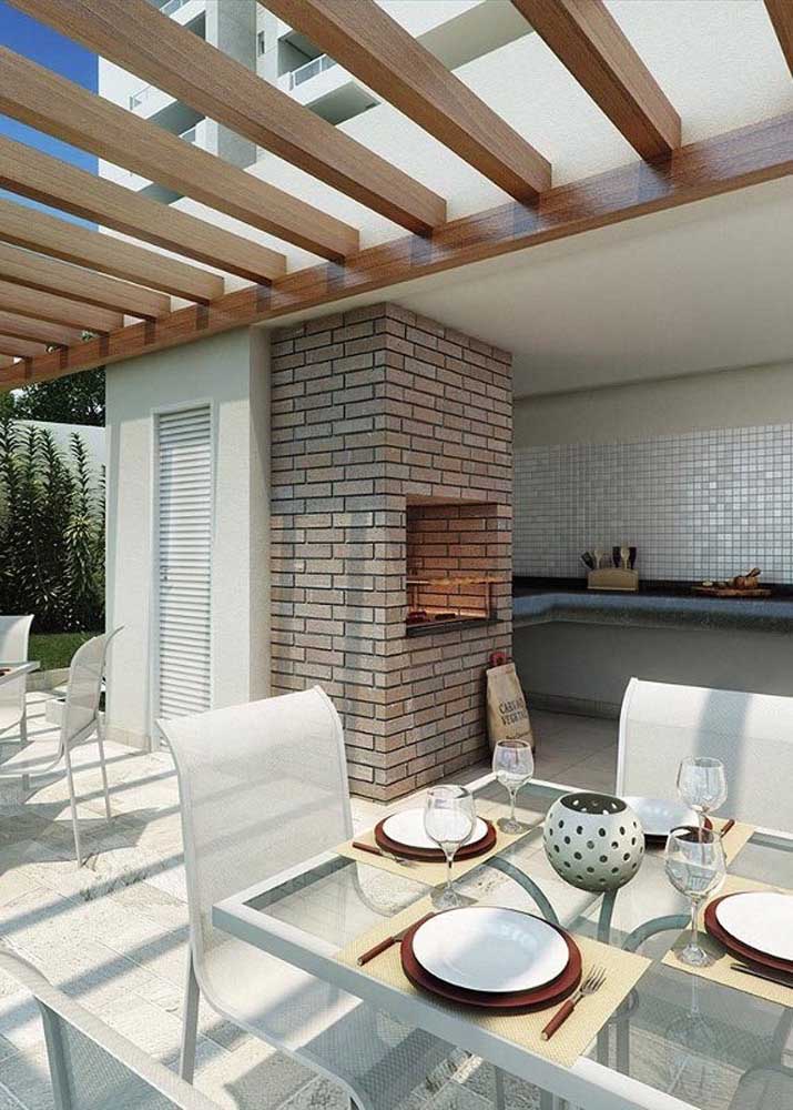 Brick barbecue for the clean and elegant gourmet environment with emphasis on the wooden pergola