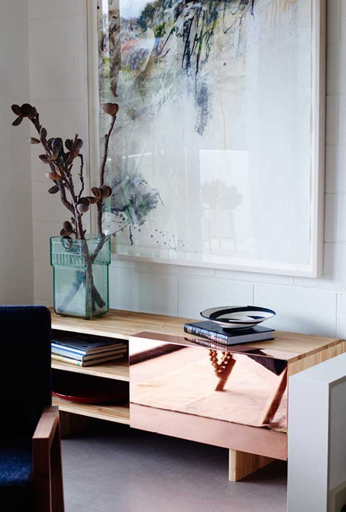 Wooden furniture with copper mirrored door; stylish inspiration to compose any room in the house