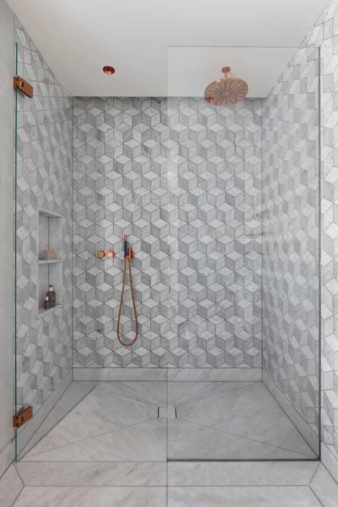 Modern bathroom with copper accents in the shower and other metals in the room