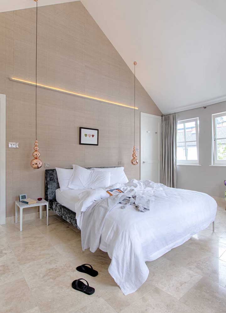 The couple's bedroom took on a sophisticated and contemporary look with rose copper pendants