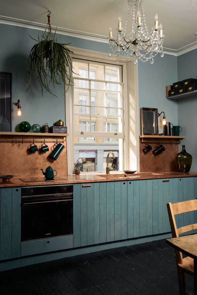 Rustic kitchen with worktop and aged copper panel
