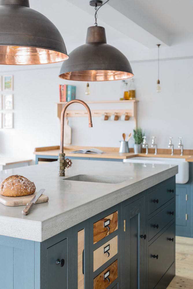 The interior of the copper fixtures changed the look of this kitchen