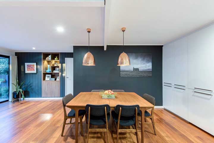 Dining room with copper pendants