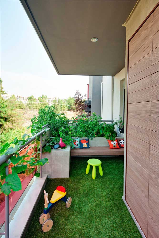 The balcony of this apartment has a fresh and green roof 