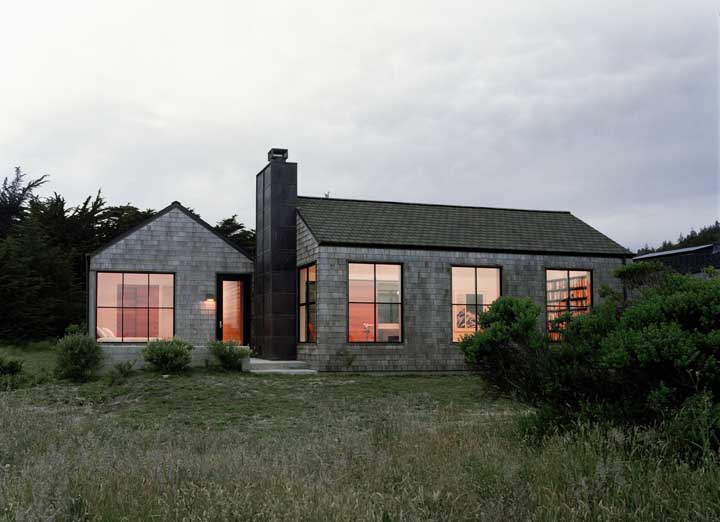 The house in the midst of nature gave permission for the grass to grow freely