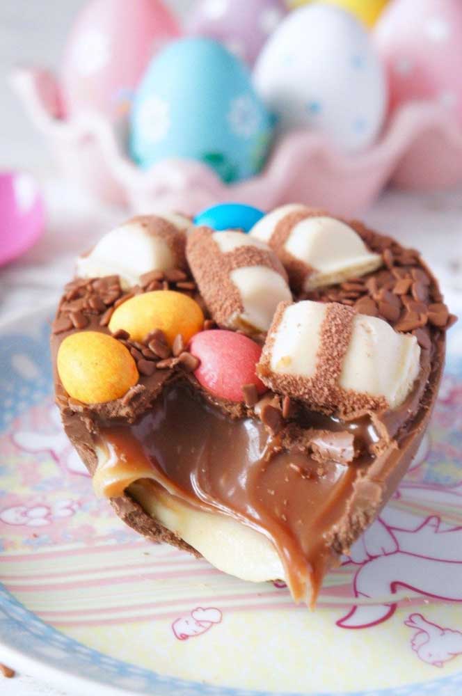 Spoon Easter egg with filling and colorful pieces of chocolate