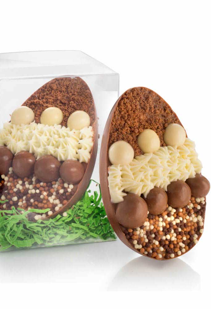 Spoon Easter egg with milk chocolate fillings, white chocolate and chocolate sprinkles divided into strips