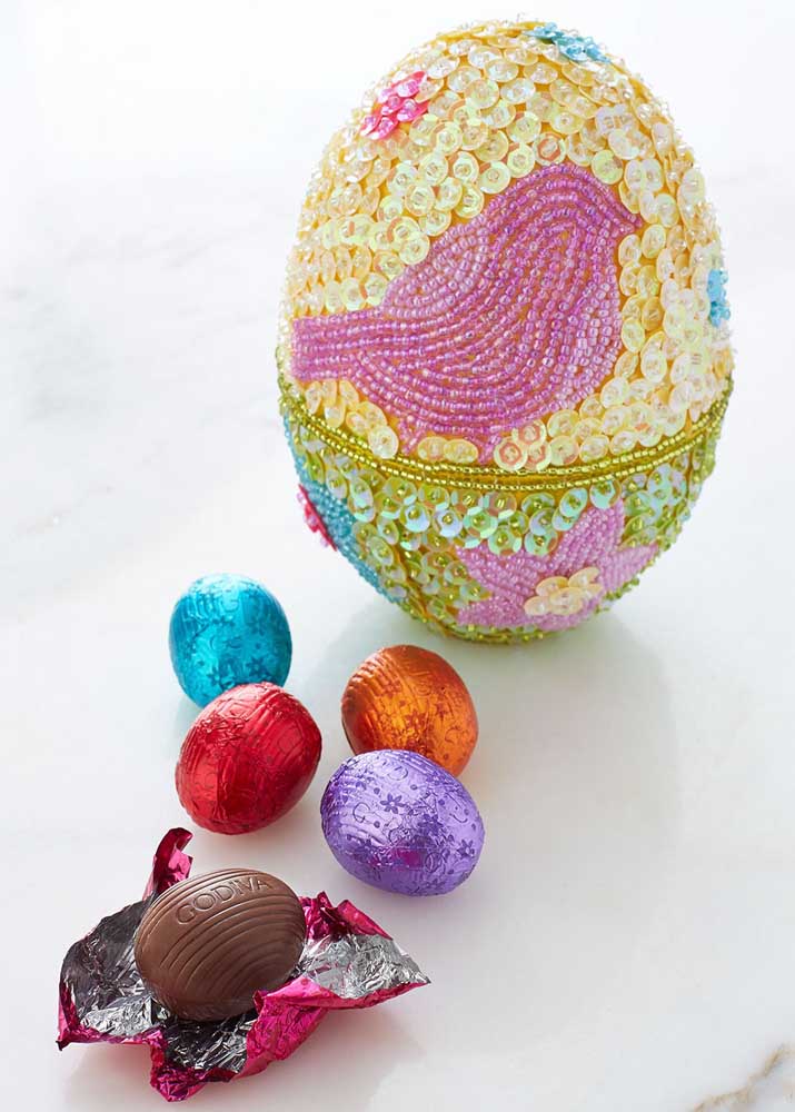 Richly decorated Easter egg; inside, chocolate eggs 