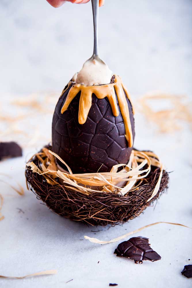 The nest that accompanies this stuffed Easter egg is a charm apart