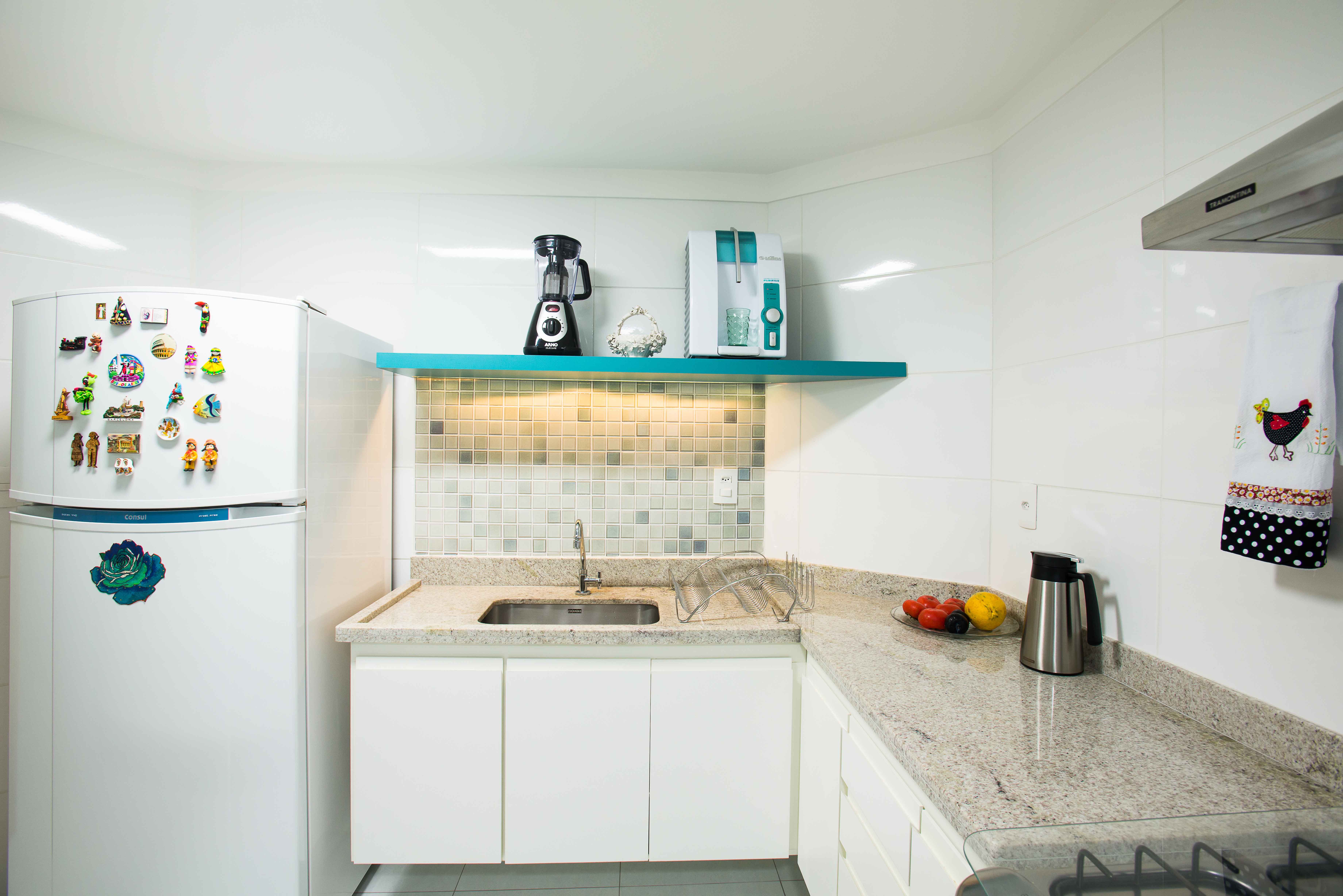 Colorful shelves can help bring your kitchen to life.