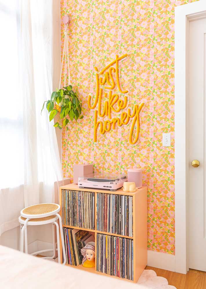 Notice that the neon color speaks directly to the wallpaper pattern