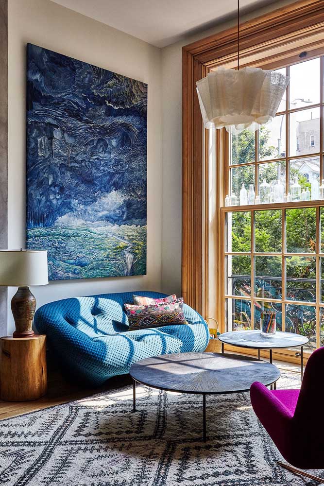 Blue sofa in a contemporary style with natural light from the living room