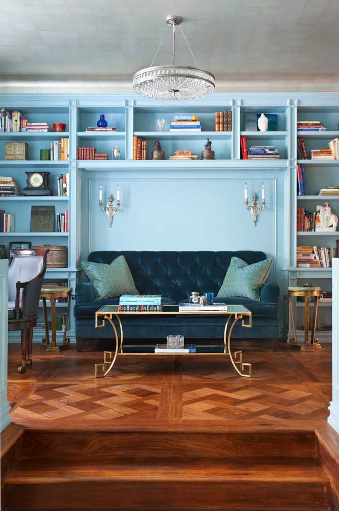 The classic blue sofa fits like a glove in this vintage living room