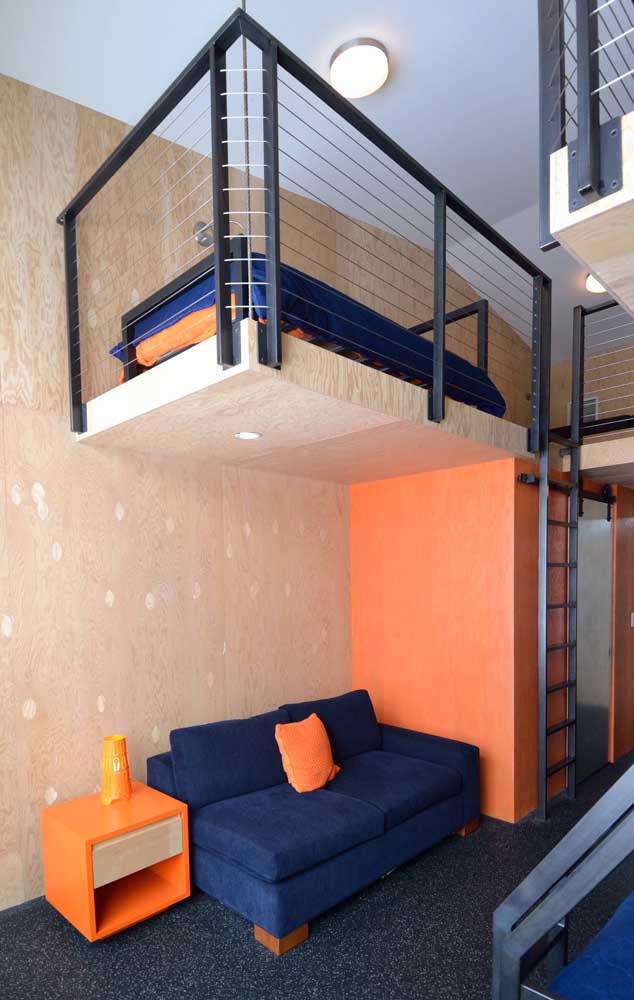 The stylish and super modern house was joined by a dark blue sofa with orange pieces