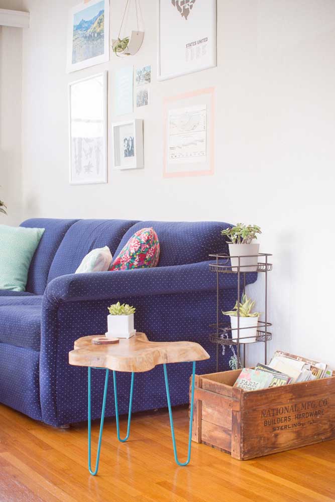 Royal blue sofa to match the wooden pieces in this room