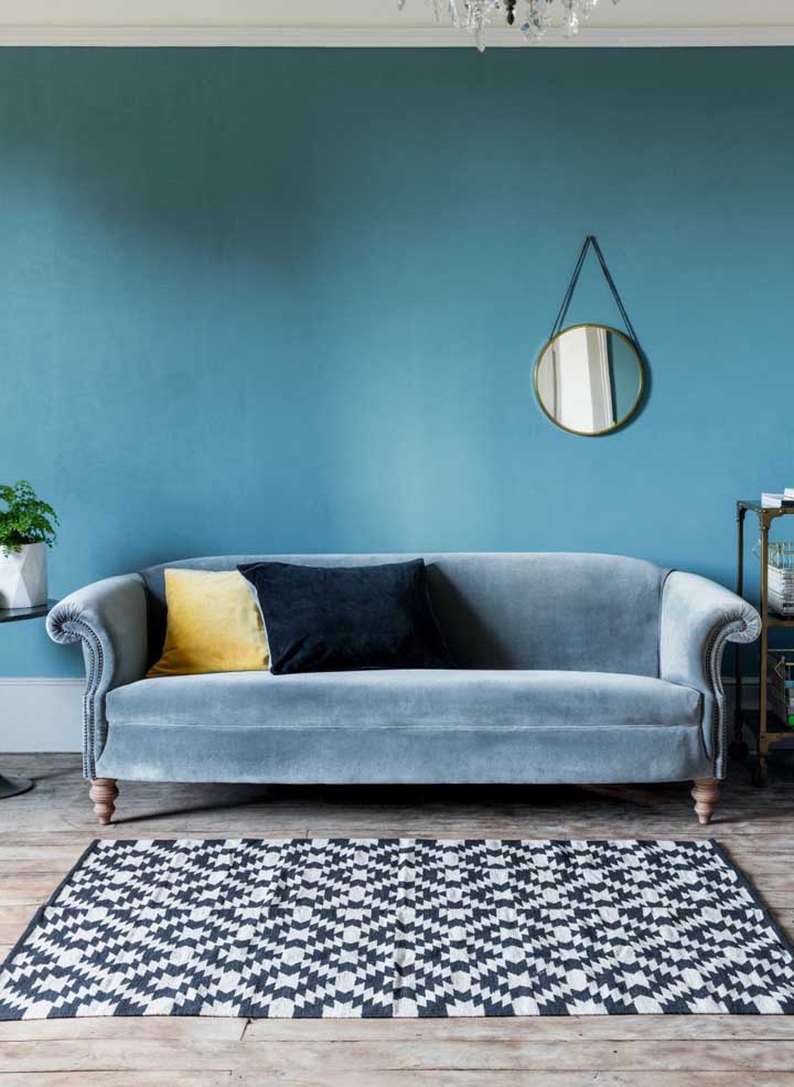 More blue, please! This living room came to life with the blue on the walls and the sofa 