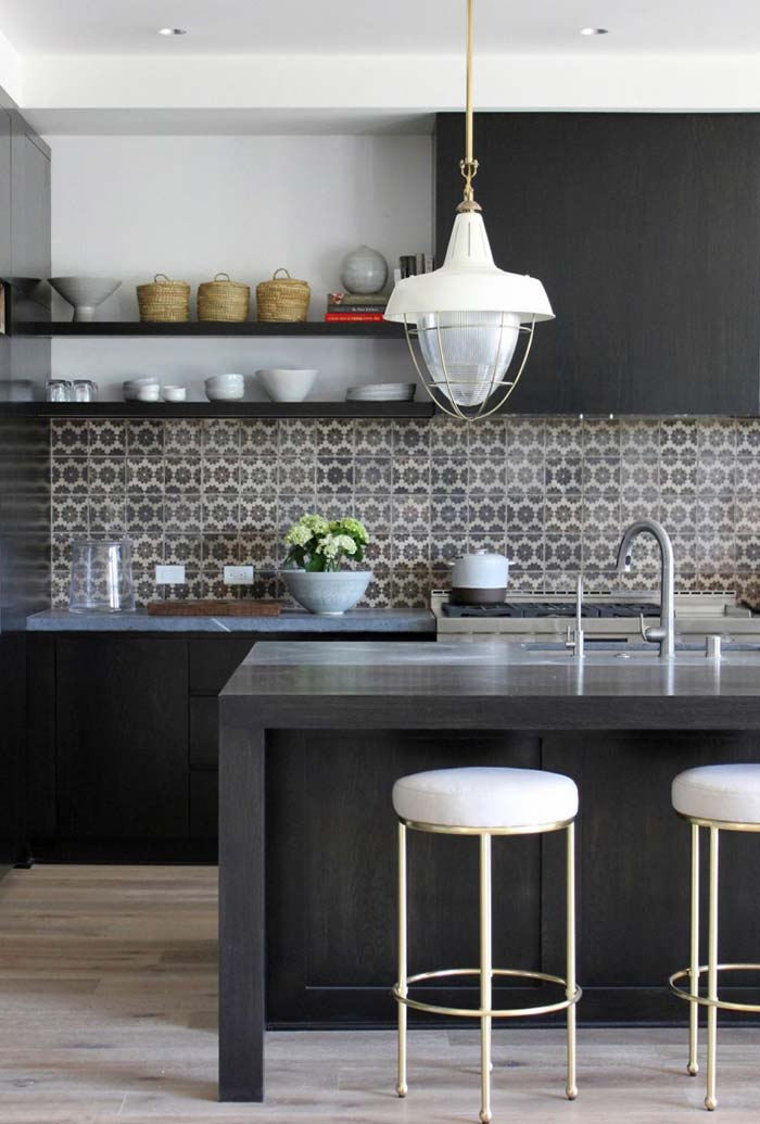 Points of light in black and white kitchen