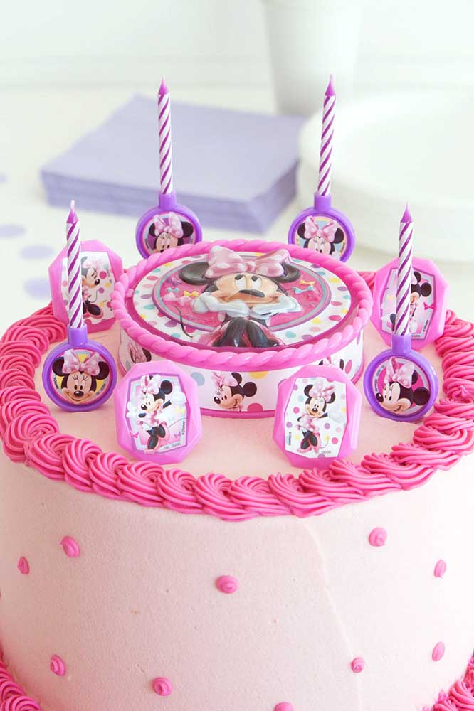 Fun Minnie cake all decorated with toppers
