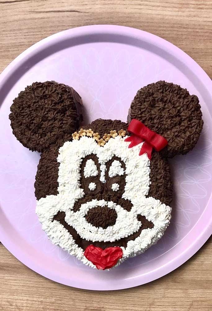 Minnie cake with the shape of the character's face and with whipped cream