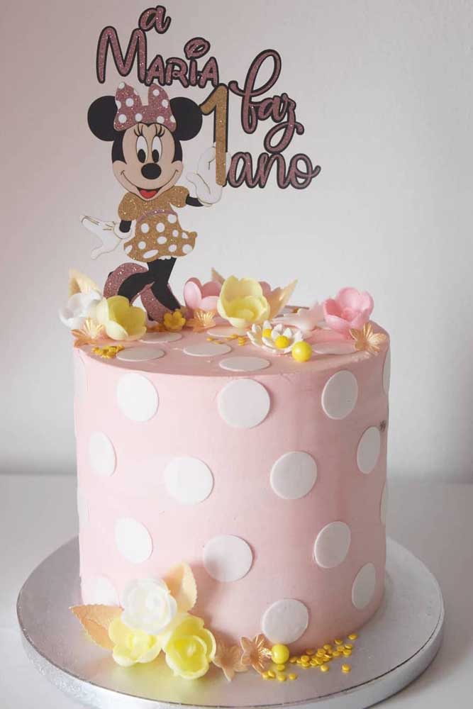 Minnie cake with polka dot print, as in the character's dress