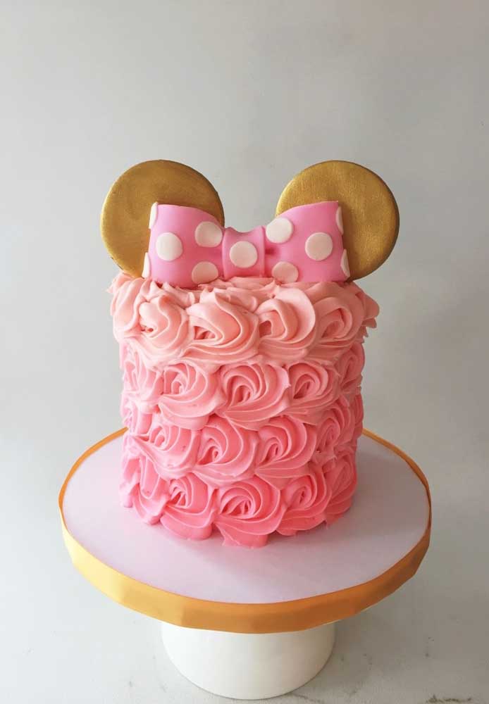 Golden ears and pink bow with polka dots