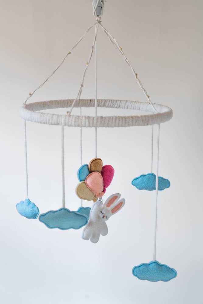 Mobile with blue felt clouds and a charming little bunny hanging