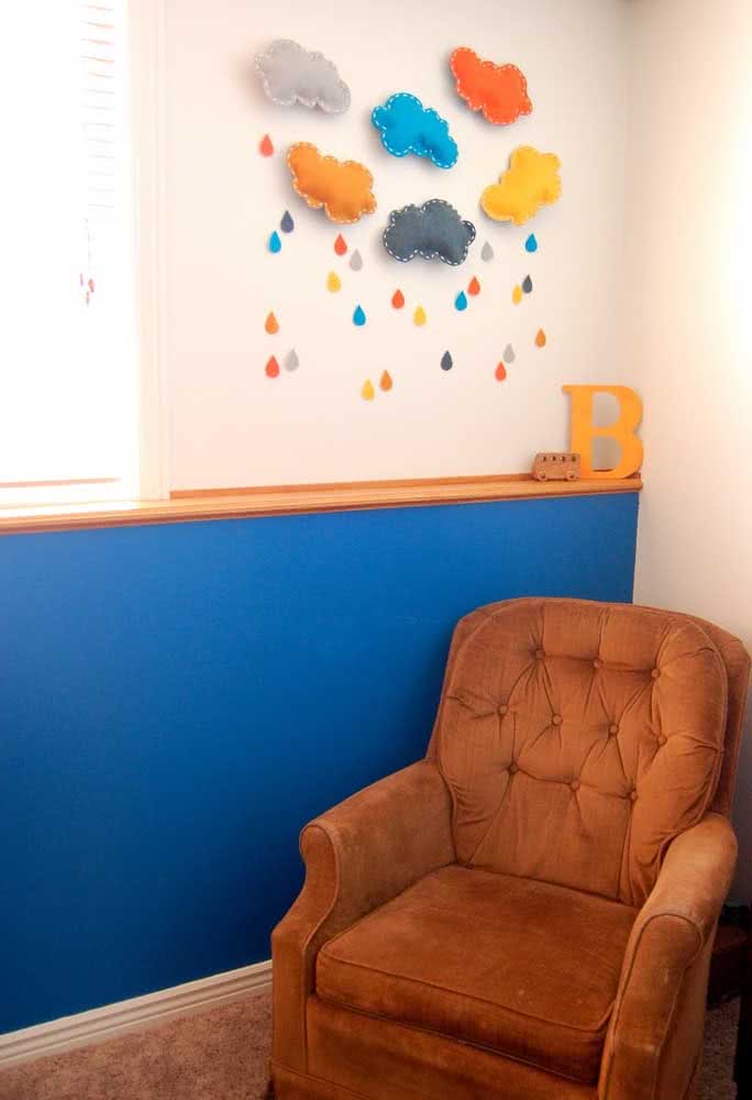 The decoration of the baby's room was complete with colorful felt clouds