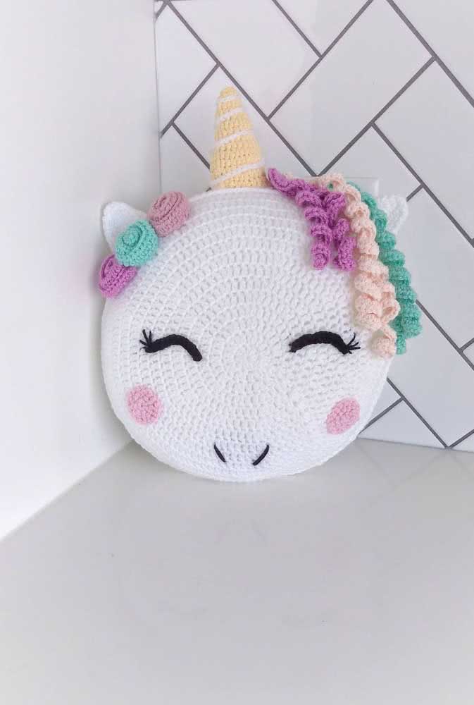 Crochet unicorn pillow.  Friendliness and delicacy in decoration
