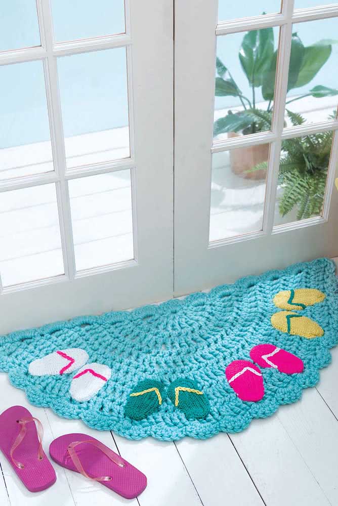 Crochet mat for entryway.  The charm here is in the design of slippers 